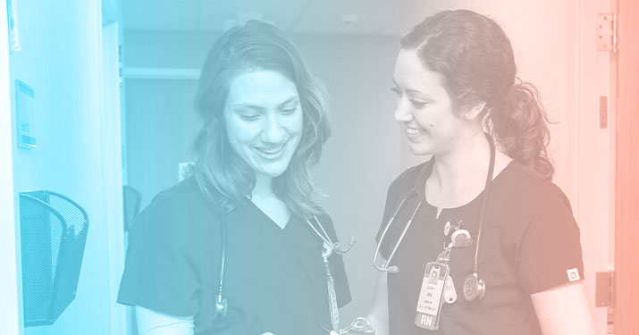 two female nurses talking