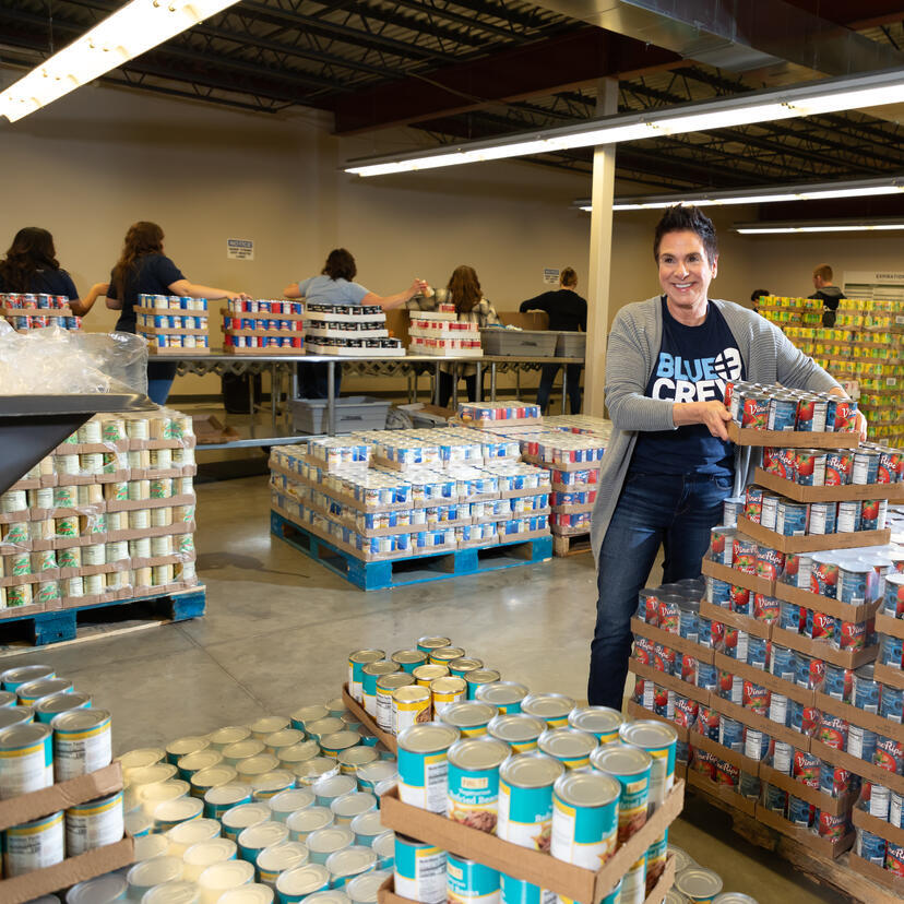 Blue Crew helping at the food bank.