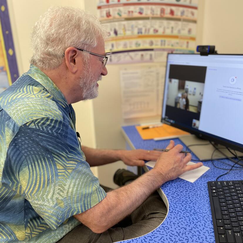 Dr. Wallace partaking in virtual care.